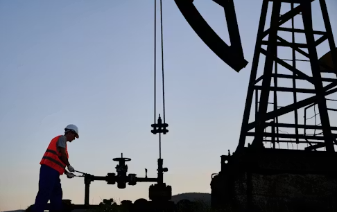 Oil and gas technician performing field technical services